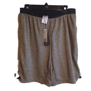 NWT   Adidas knit Grey shorts. Black waist band, white stripes. Size medium.